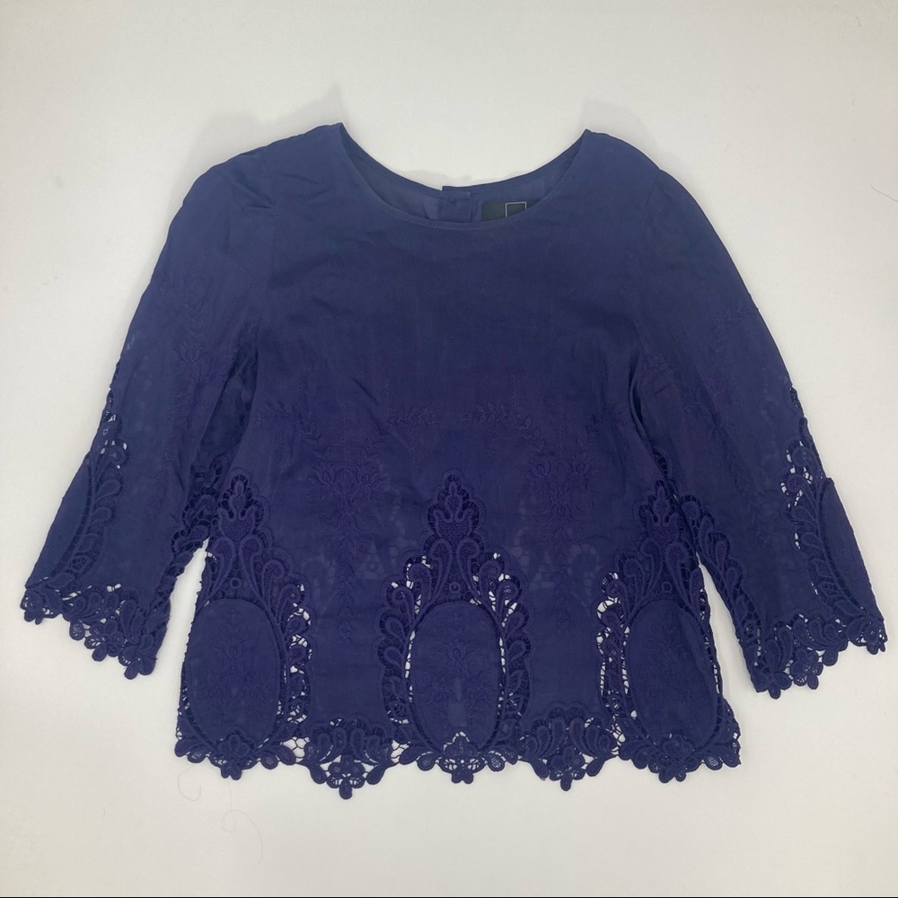 Dolce vita silk blend top buttons up the back and embroidered.